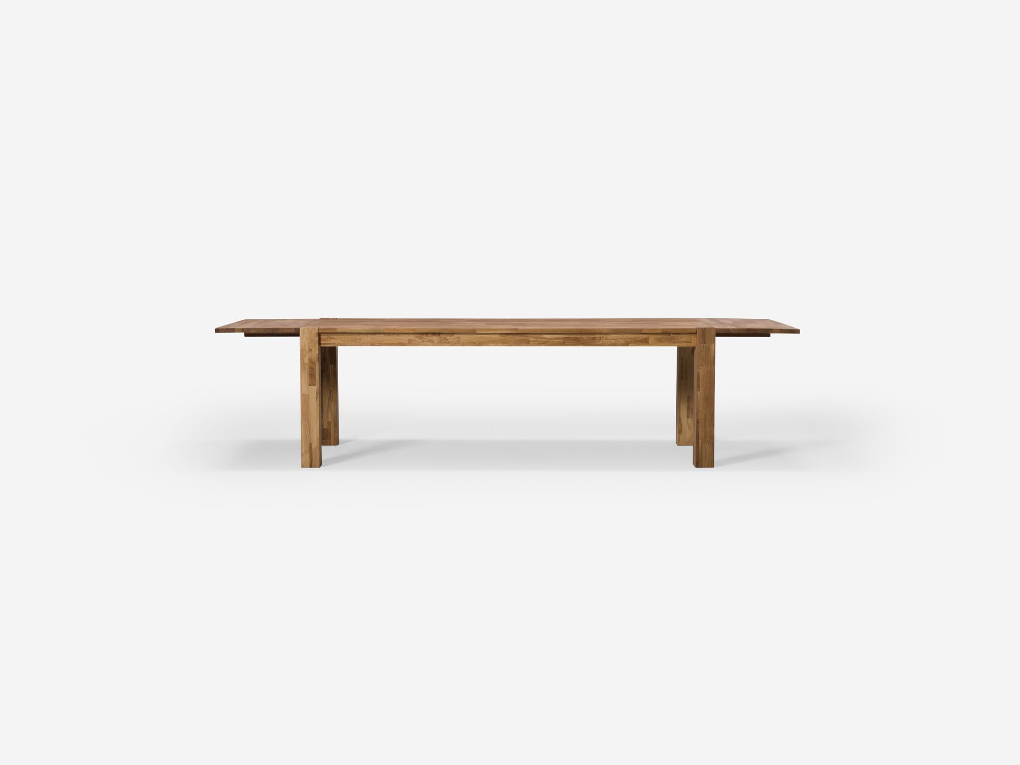 Front view of the large oak Harvest modern rustic dining table with leaves